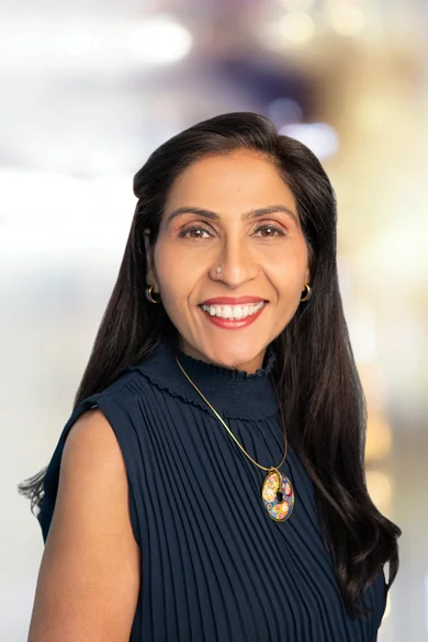 Portrait of Renu Ojha Suresh, REALTOR®.